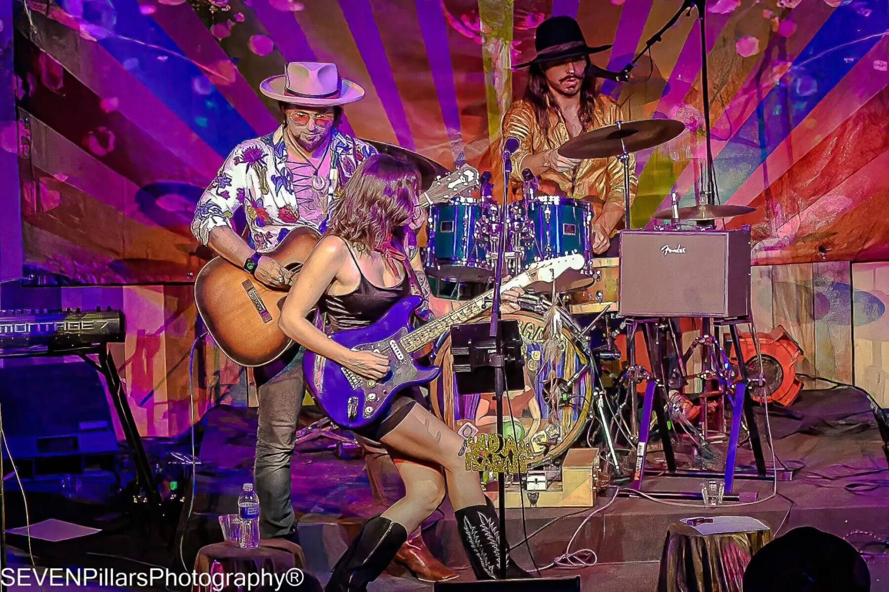 guitarist wearing cowboy boots