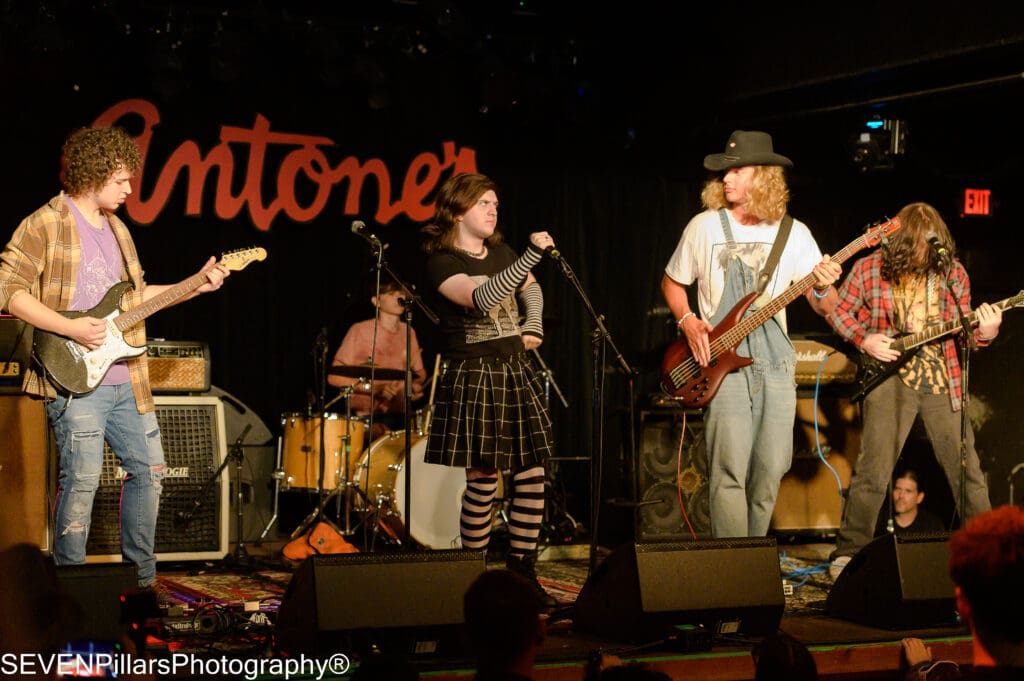 two members of the band looking at each other during a performance