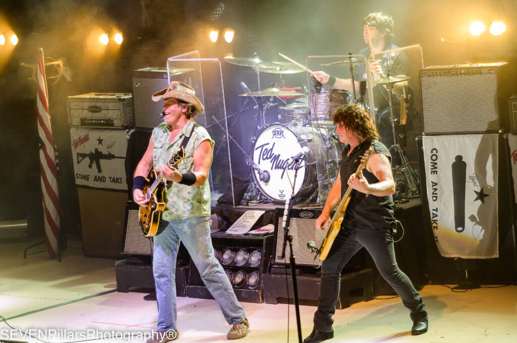 Ted Nugent performing with his bandmates