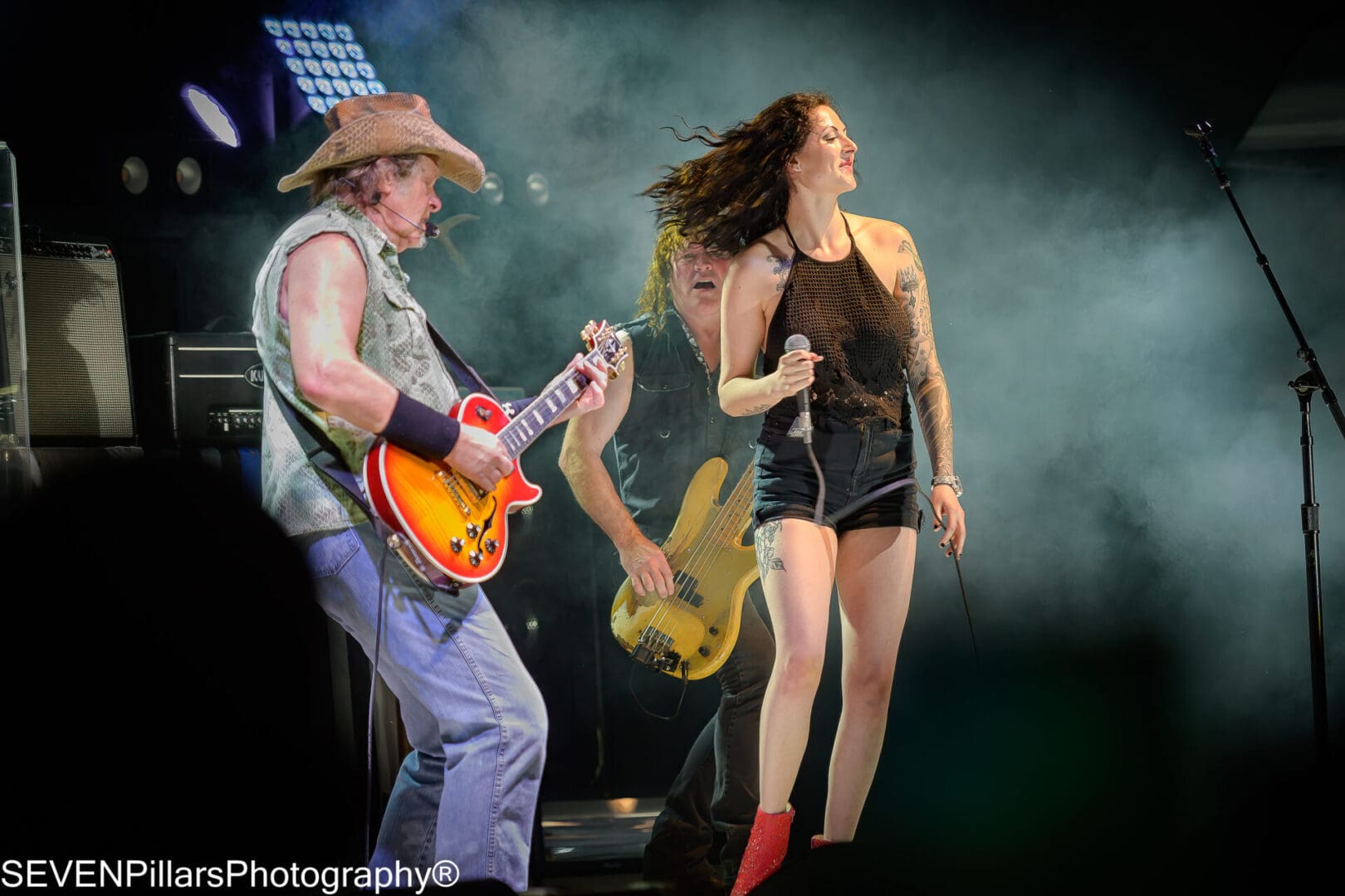 Ted Nugent and Lexxi Garza performing together