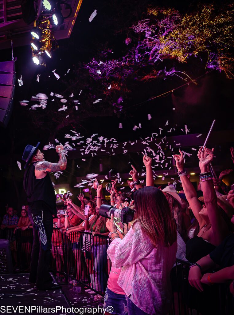 a performer standing near the crowd