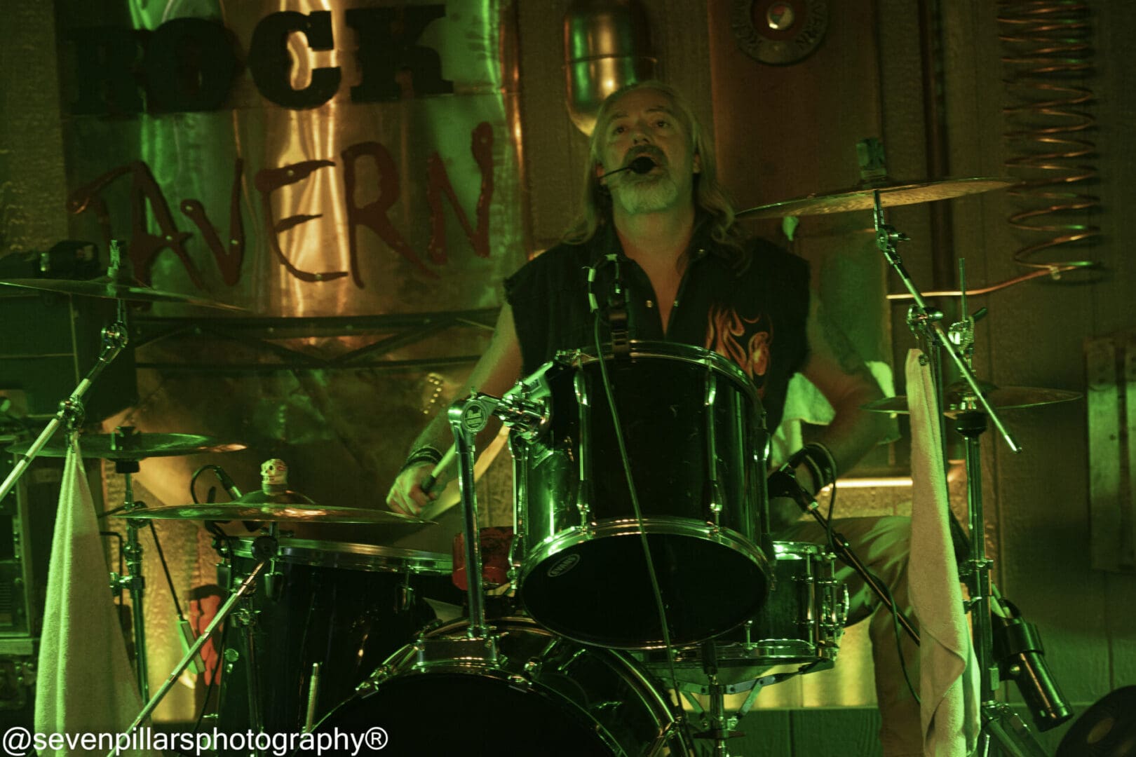 Wayne Steagall Playing Drums In A Rock Concert